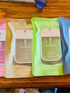 Brand new set of 4 Touchland Hand Sanitizers